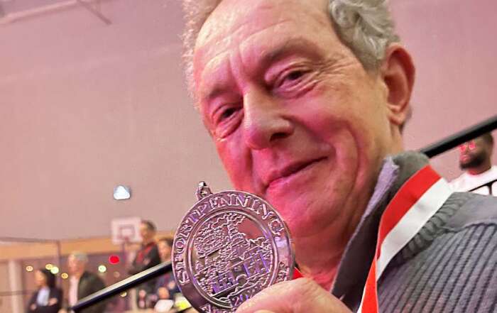 Han Eijbergen portret met zilveren sportpenning