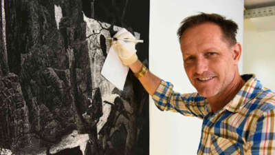 Henri van Noordenburg aan het werk